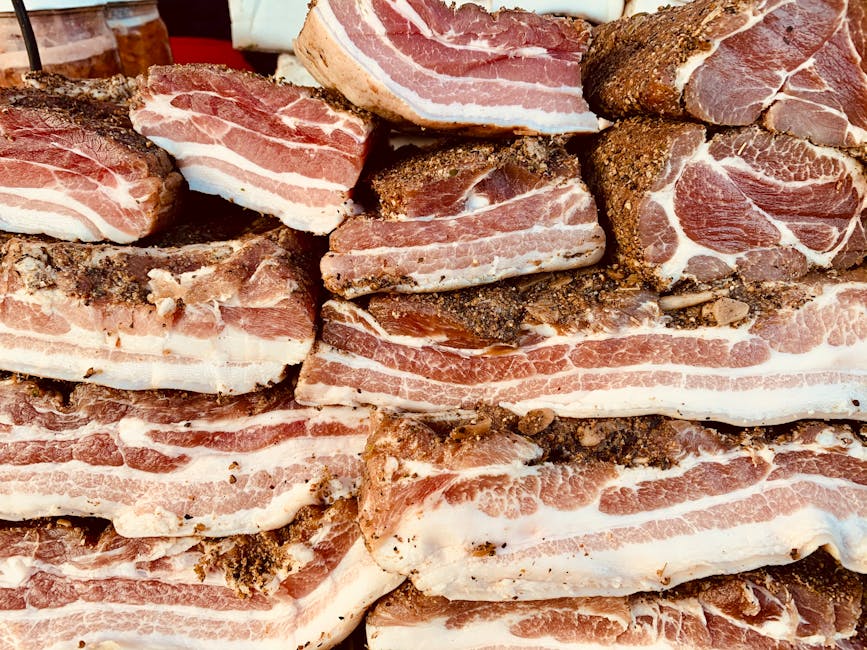 Raw pork belly slab, stacked, ready for marinade
