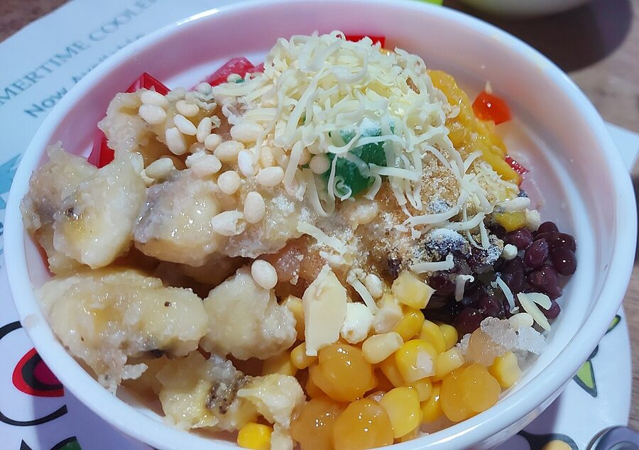 Halo-halo dessert in a glass with ube and beans